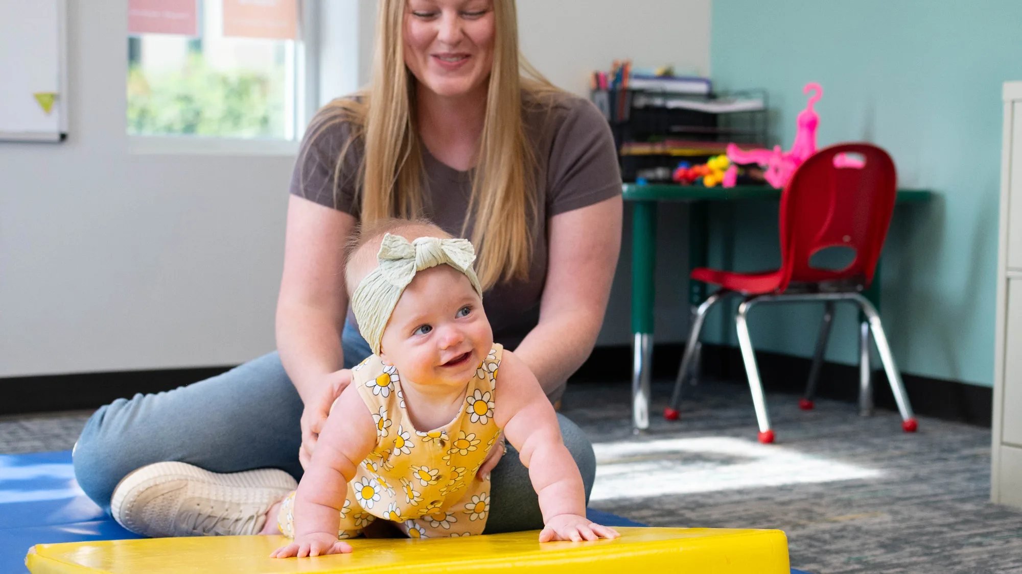 smiling baby and mom